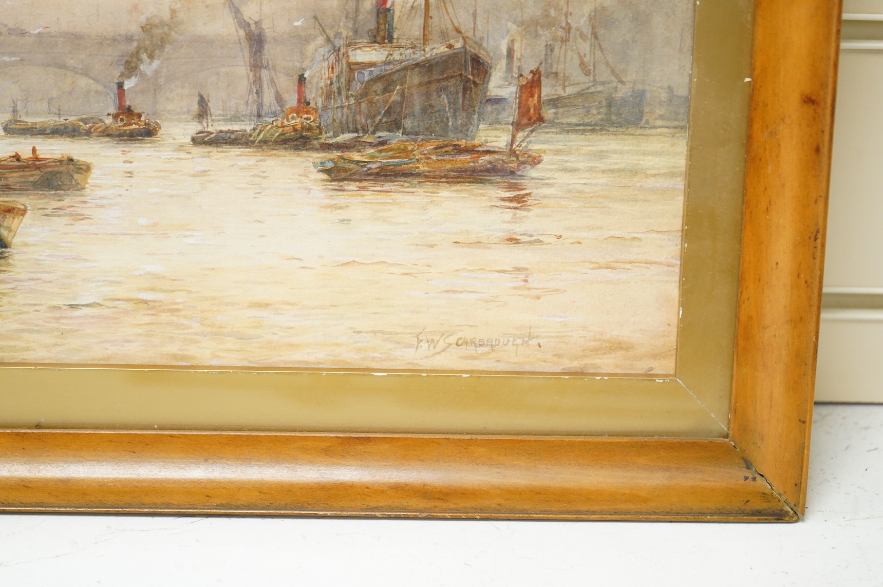 Frederick William Scarborough (1860-1939), Thames view with tug boats and ships, signed, watercolour, 23 x 52cm
